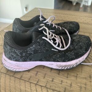 Used and well worn women’s Brooks running sneakers, size 6